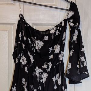 Black With White Floral Design